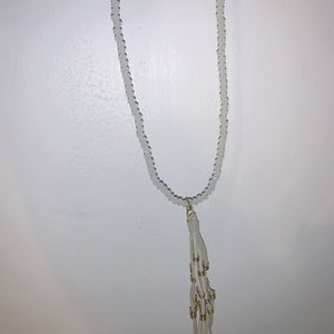 Long necklace with leather tassels and beads
